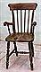 F025 - Lath back carver chair
