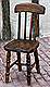 F115 - Spill back chair